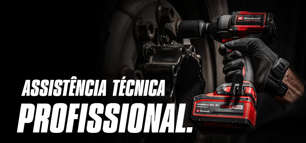 Grande plano de uma chave de impacto vermelha sem fios a ser utilizada numa roda, com o texto “Serviços Profissionais”.