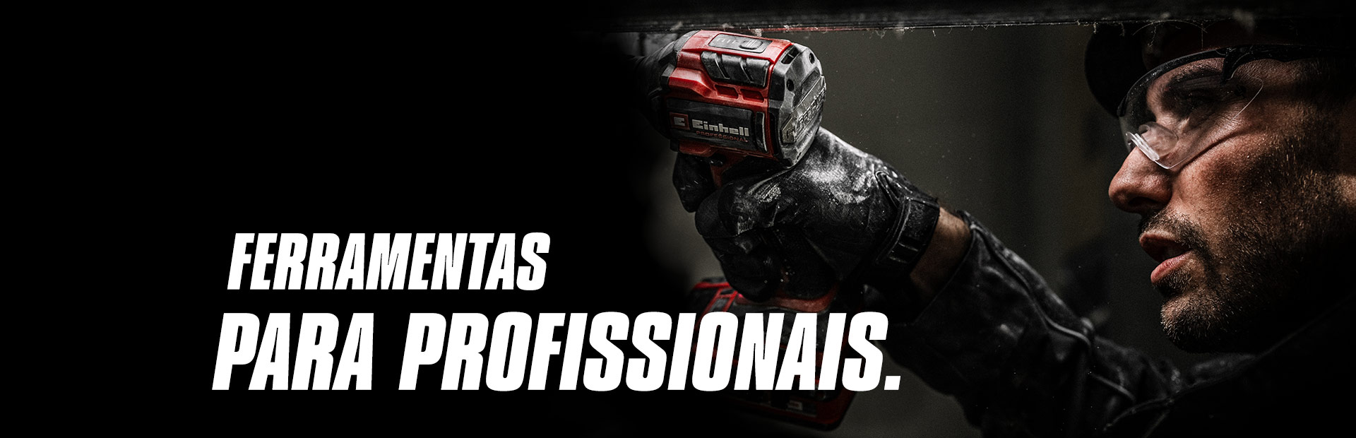 Uma mão segura uma chave de impacto sem fios vermelha a ser usada numa viga metálica, com o texto "Ferramentas Elétricas para Profissionais".