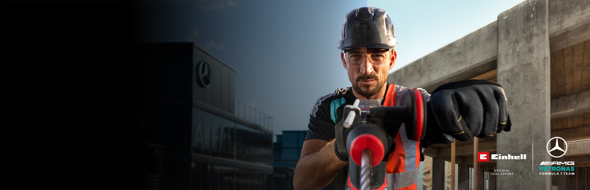 Um mecânico com equipamento de proteção a perfurar com uma ferramenta elétrica num estaleiro de construção.